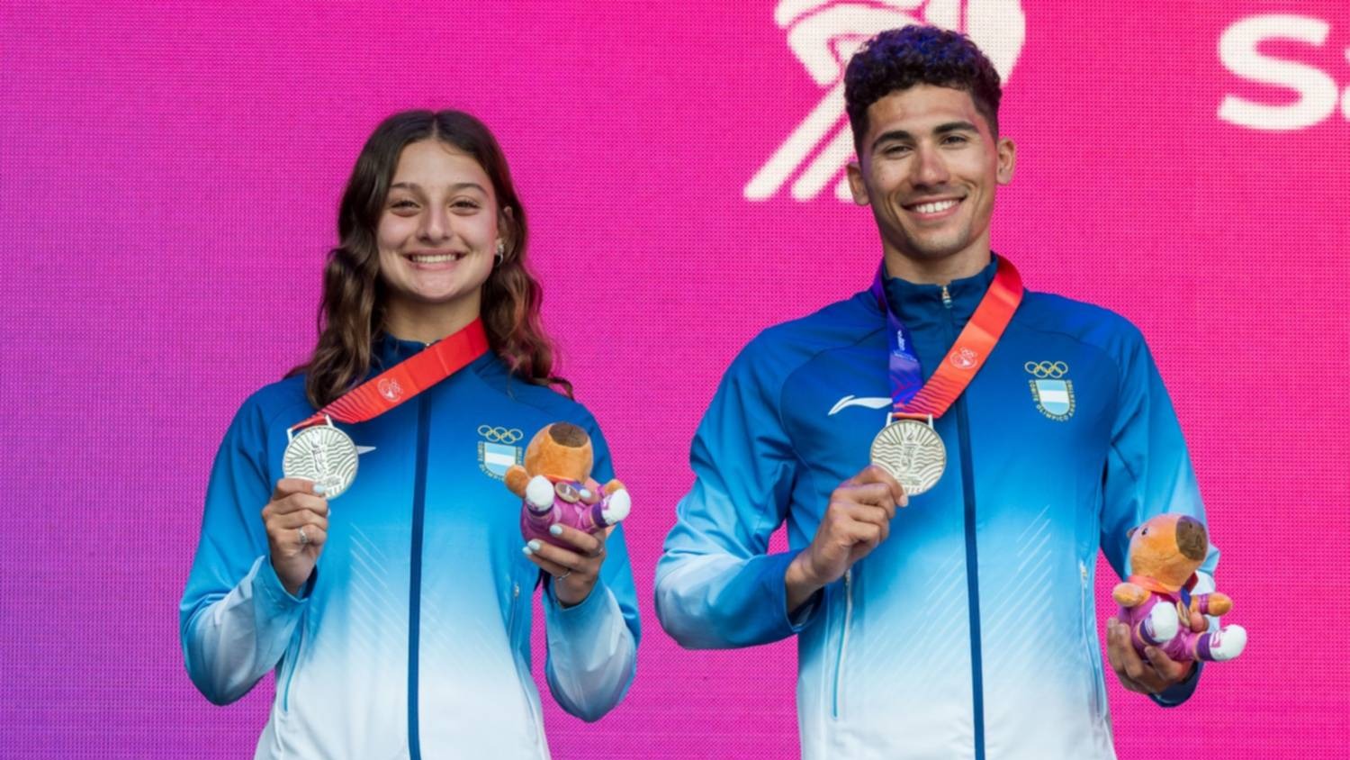La dupla argentina con la medalla de plata